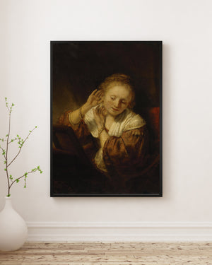 Rembrandt van Rijn - Küpeli Genç Kadın Poster